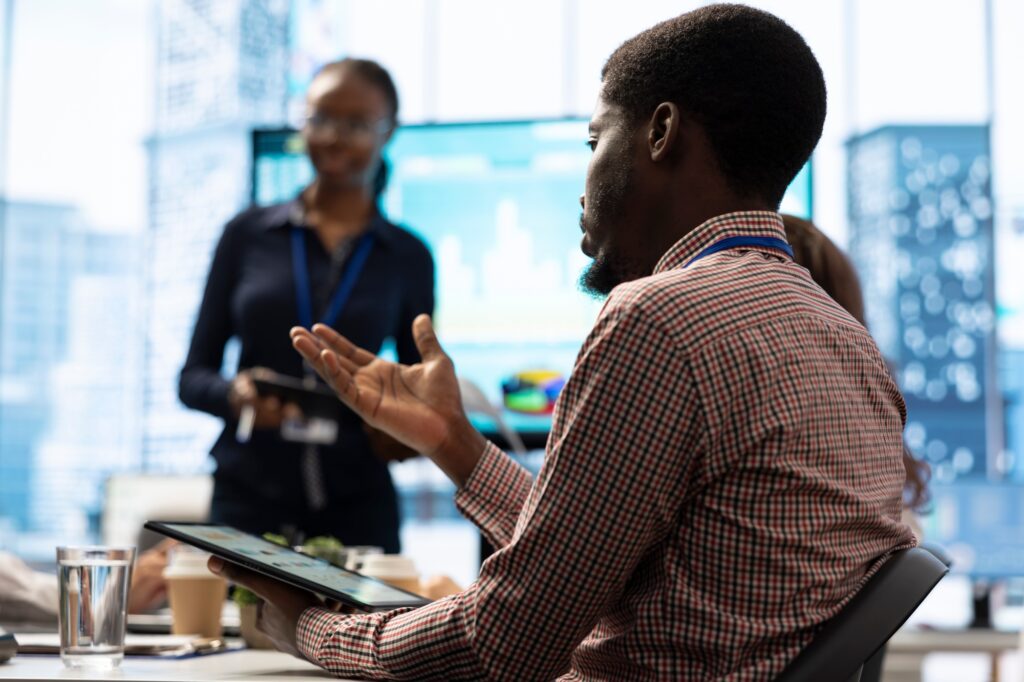 Investor and associates participating in an advisory board meeting