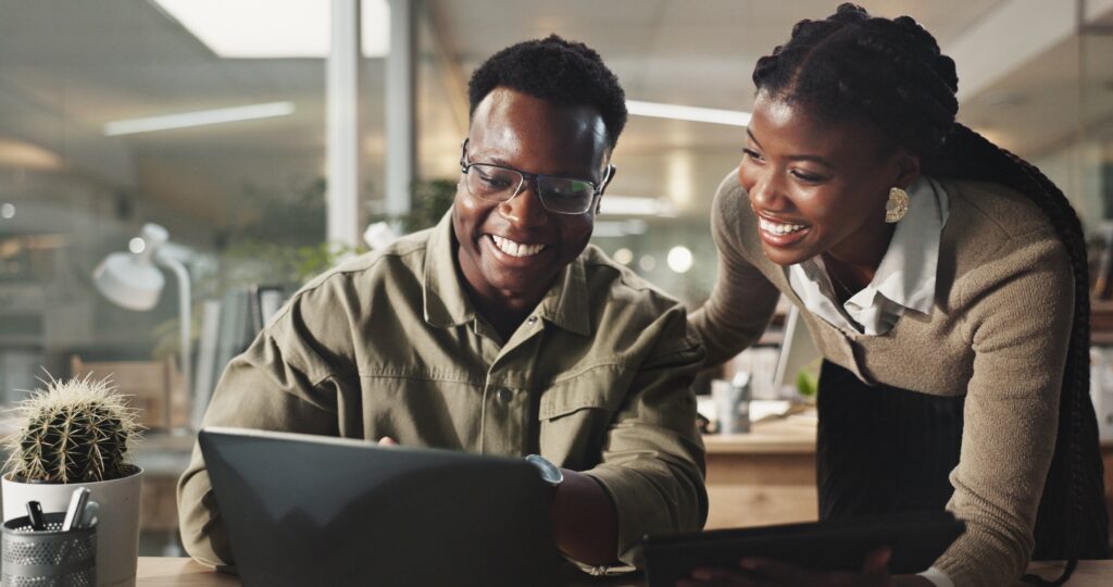 Teamwork, mentor and laptop with black people in office for planning, collaboration and coaching. B
