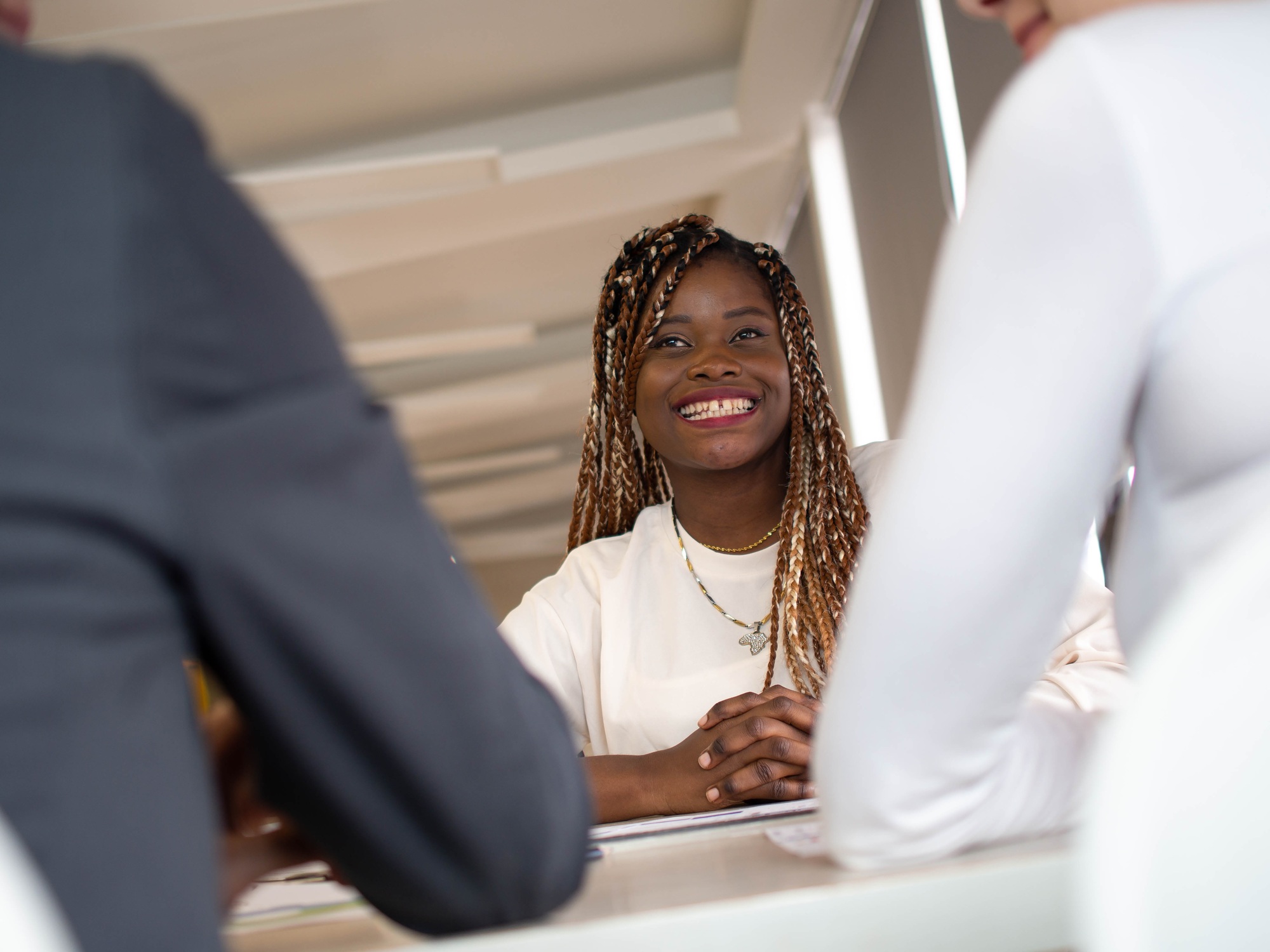 Businesswoman manager black person African American people Afro hair happy smile indoor boardroom
